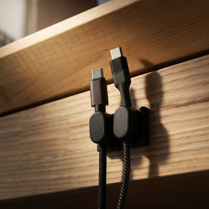 Orange magnetic cable organizer product variant with dual magnetic hold graphic